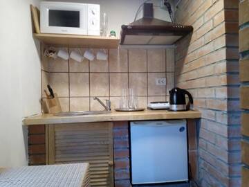 Фото номера Трехместный номер с душем Кемпинги E.A.MINIKAMP г. Lelle 10